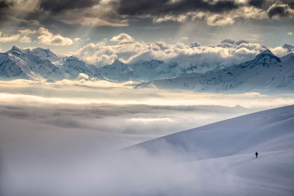 Hiking above the fog on the Niederhorn in Bernese Oberland