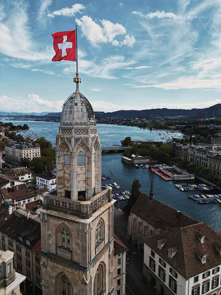 Swiss flag on a grossmunster tower