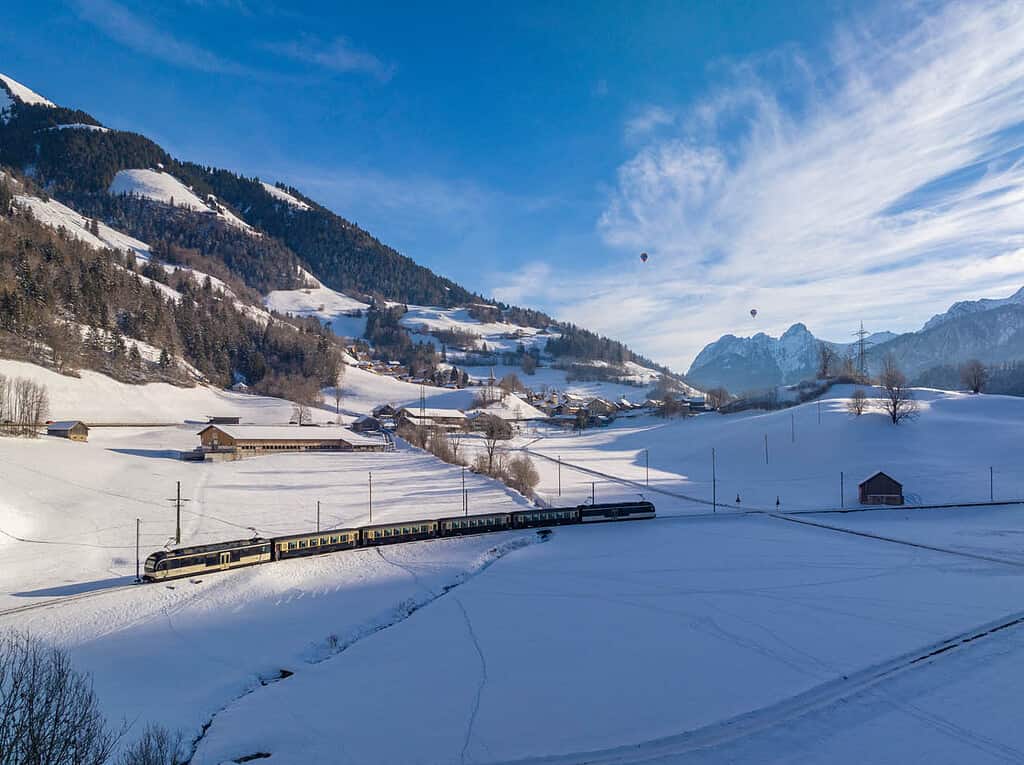 Goldenpass line train in winter landscape