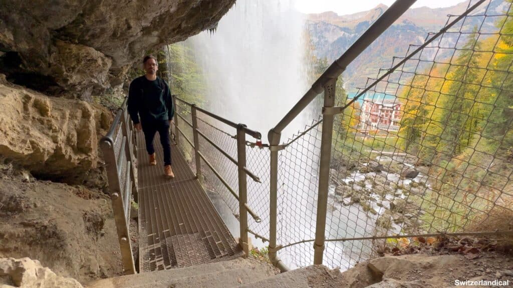 The Swiss writer Rocher on the bridge behind the Giessbach Falls